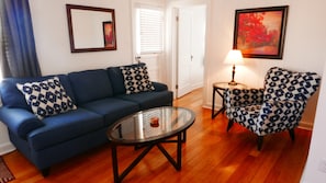 Living room, view of door to balcony and bedroom