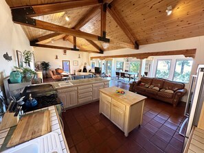 View from large fully equipped kitchen to the very comfortable living area.
