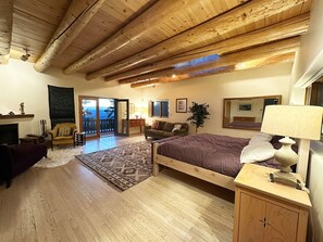Spacious Master Bedroom with private balcony looking west to the million dollar views.