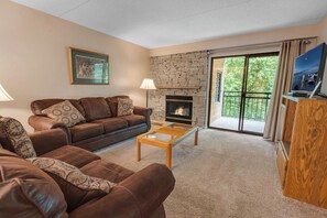 Large living area with entrance to the balcony