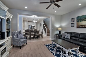 Living Room Side View - The Living Room is conveniently located adjacent to the Kitchen and Dining Table and is a great place for entertaining guests during downtime.