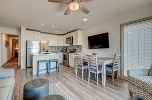 Ocean Dunes 317 - Living Area - The living/dinning area is spacious enough for the whole family to enjoy!