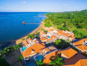 Aerial view showing beach and unit (front left center on beach)