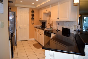 Pantry behind the far door and plenty of cupboard space for all your goodies.