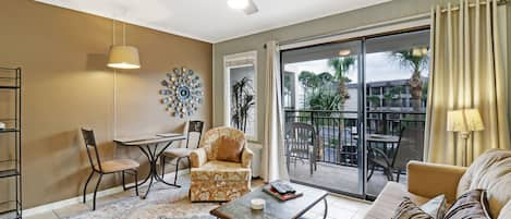 Living /dining area - Newly painted with lots of natural light in this combined living and dining area.