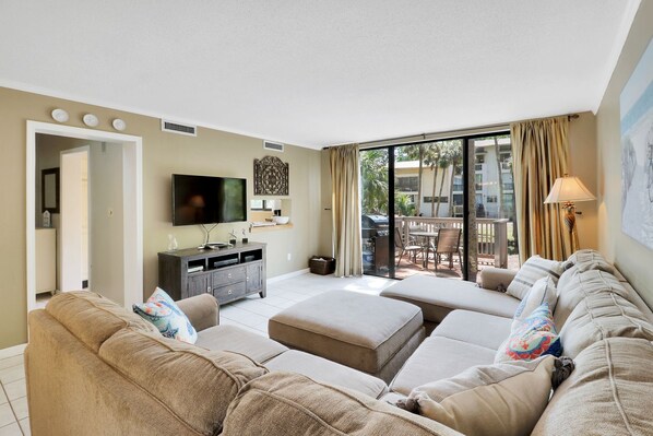 Living area - Great space for hanging out with the family and watching TV.  Access to the sunny deck.