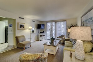 Living Room - The living room and dining area has upscale furnishings and plenty of room for family gatherings.