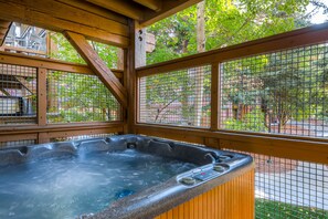 Town Point a102 offers a private hot tub on the private deck that overlooks the courtyard.