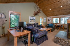 Living room with computer, printer and dual monitors work station