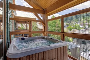 Available in the winter, Town Pointe C302 has a private hot tub on a private patio.
