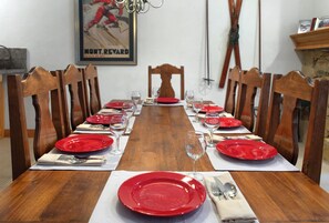 The wood dining table offers seating for 8.