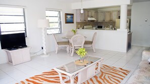 The living/dining room opens onto the attractive, well-equipped kitchen.

