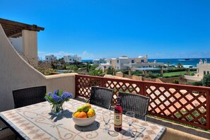 Enjoy alfresco dining whilst looking out to sea and cooking fresh local food on the double BBQ.