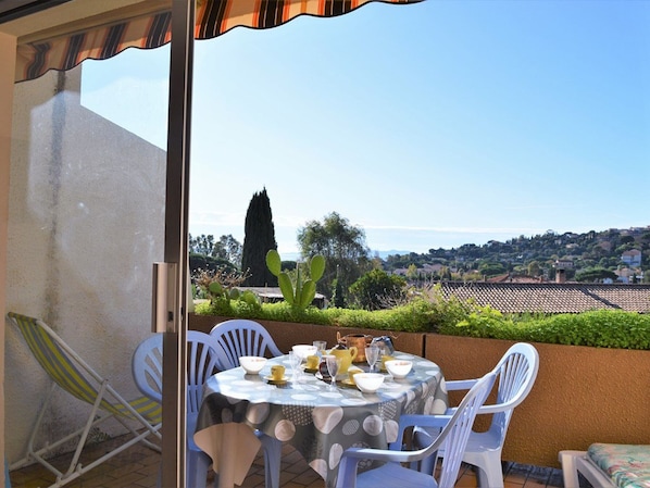 terrasse avec store