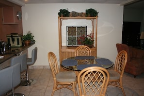 Nice size dining area with bar stools will seat 7 persons