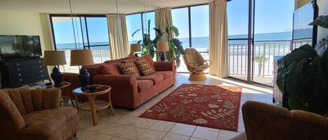 Living room with queen sofa sleeper and ocean view