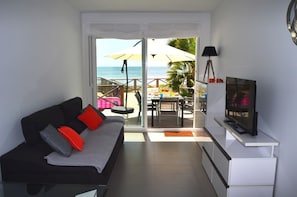 Modern living room equipped with T.V and comfortable furniture
