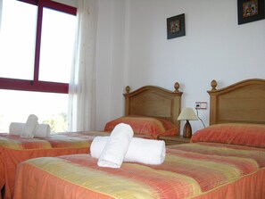 Lovely Bedroom of Verdemar Apartment