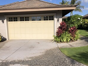 External view of home w:two-car garage. This is unit #210.