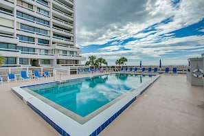 The Terrace Community Heated swimming pool with views of Siesta Key Beach.