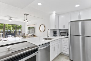 Modern open-air kitchen flooded with natural light