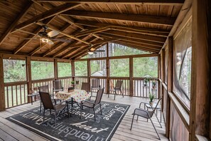 Enjoy morning coffee or evening breeze on spacious screened porch!