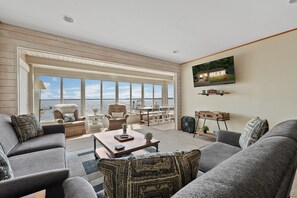 A cozy living room with spectacular full lake views 