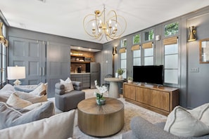 Functional living space featuring a modern kitchenette.