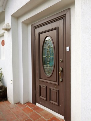Safe and secure entryway to villa. No steps from street to unit.