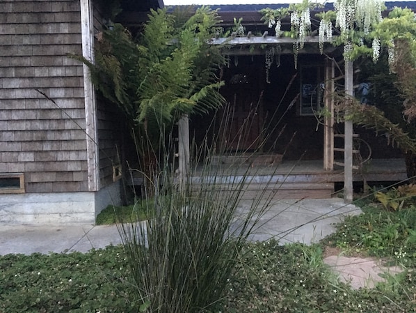 Front walk, Wisteria Arbor, redwood porch, and Front Entry