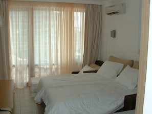 Inside the apartment - double bed and extra bed