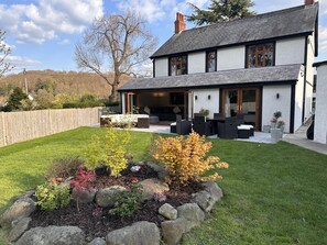 New superb extension and patio with an abundance of seating for the family 