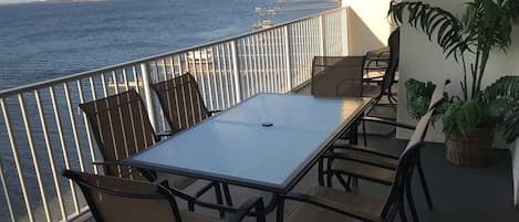 Big deck with outdoor dining overlooking Big Bay