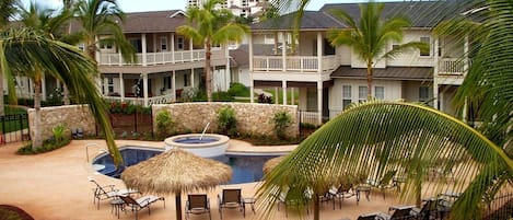 Luxury resort pool view from the master bedroom lanai of our Hawaii condominium