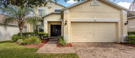 Beautifully landscaped front entry welcoming you home