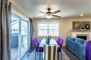 The fun and comfortable design continues in the sunlit dining area.