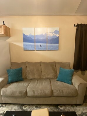 Comfy couch so you can relax after a long day of exploring