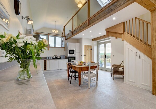 Impressive kitchen and dining area with huge amounts of space and light