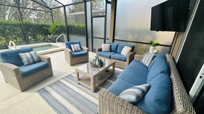 Lanai area furniture with outdoor TV