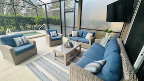 Lanai area furniture with outdoor TV