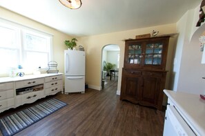 Kitchen with antique hutch and buffet.