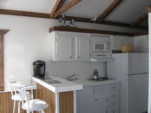 Kitchen with cooktop and micro wave