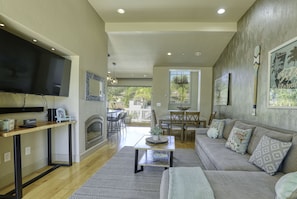 Beachy Keen Living Room - Open concept design blends indoor and outdoor living space.