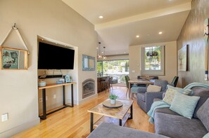Inside, cozy up by the fireplace or cook up a feast in the well-appointed kitchen.