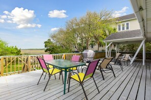Open Deck with Ample Seating & Gas Grill