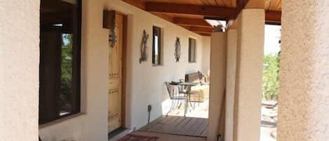 Front Entry with Redwood Deck overlooking Koi Pond 