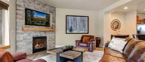 Bear Hollow Village 5610: Cozy living room with a warm gas fireplace and comfortable sofa