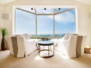  Sink into these chairs and watch the rest of your guests frolic on the beach.