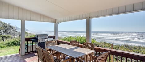 Enjoy grilling and dining with a view of the Pacific from the covered porch.