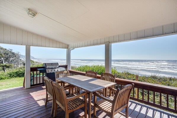 Enjoy grilling and dining with a view of the Pacific from the covered porch.